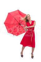 Pretty glamour woman holding a broken umbrella