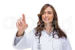 Female doctor touching something