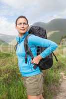 Female hiker looking away