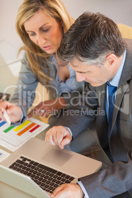 Business people working together at desk