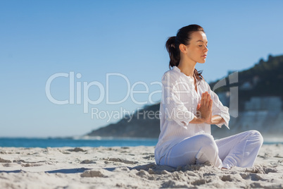 Calm woman practicing yoga
