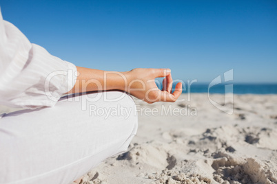 Close up view of womans hand in yoga pose