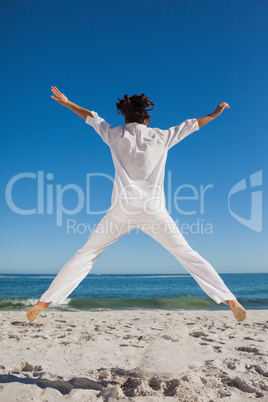 Woman jumping back to camera