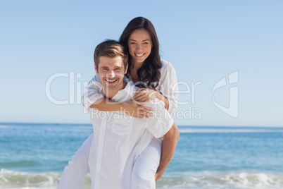 Happy couple smiling at camera