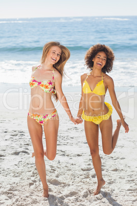 Happy women having fun on the beach