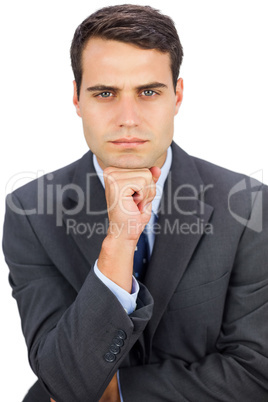 Frowning businessman looking at camera Frowning businessman looking at camera