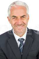 Pleased businessman looking at camera