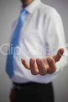 Close up of a casual businessman reaching out
