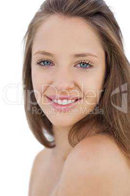 Smiling brunette model looking at camera