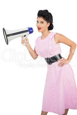 Smiling black hair model holding a megaphone