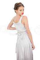 Dreamy model in white dress posing