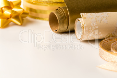 Gold wrapping paper and bow Christmas decoration