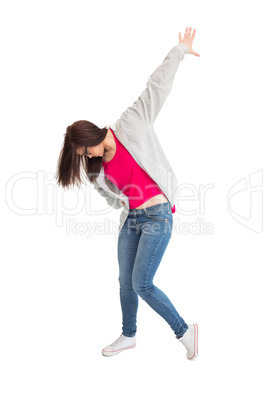 Trendy young woman dancing
