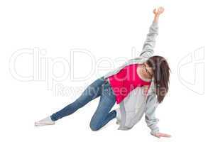 Pretty young woman making hip hop pose