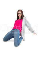 Smiling young woman making hip hop pose