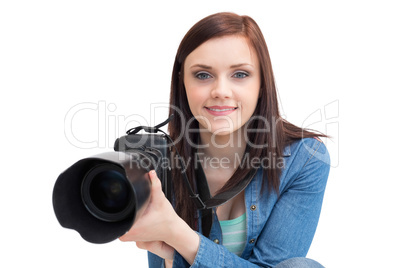 Casual young photographer posing