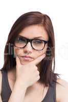Thoughtful young woman wearing glasses posing