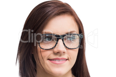 Cheerful young woman wearing glasses posing