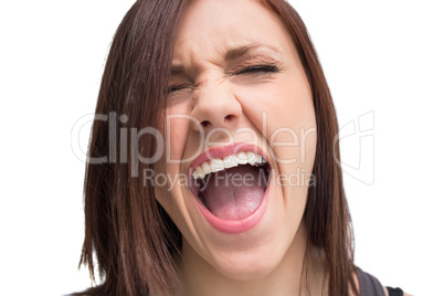 Close up on pretty brunette shouting