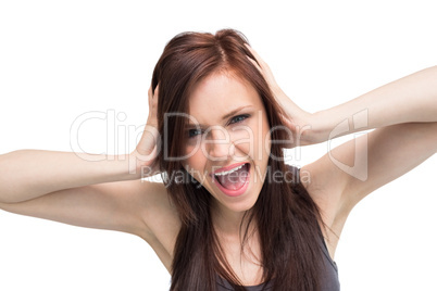 Close up on furious brunette shouting