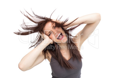 Furious pretty brunette tossing her hair