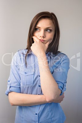 Pensive serious brunette posing