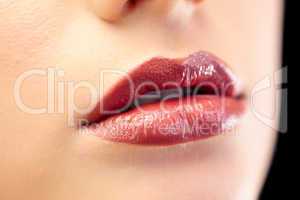 Close up on beautiful models glossy lips