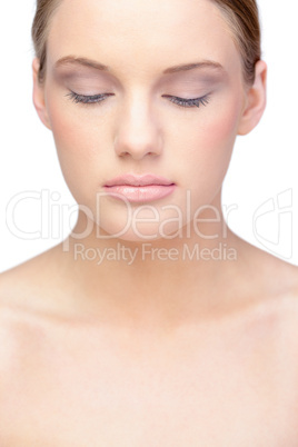 Relaxed blonde model wearing natural make up