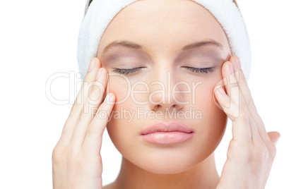 Content blonde model wearing headband closing eyes