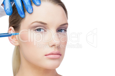 Attractive young model having botox injection