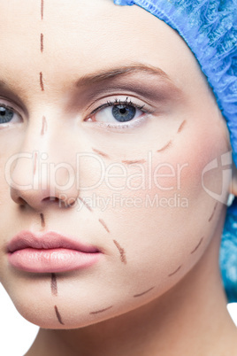 Close up on relaxed young patient with dotted lines on the face