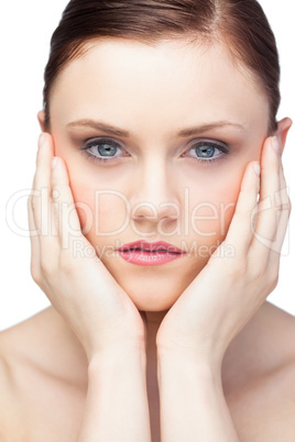 Thoughtful gorgeous brunette posing