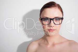 Relaxed clean model with classy glasses posing