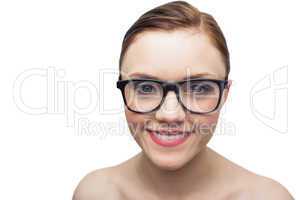 Smiling clean model with classy glasses posing
