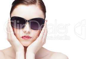Glamorous young model wearing stylish sunglasses
