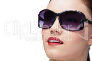 Sensual model wearing classy sunglasses