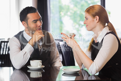 Business people talking over coffee