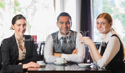 Business team having coffee together