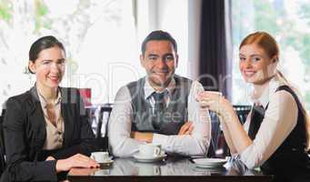Business team having coffee together