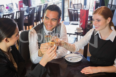 Business team toasting with champagne