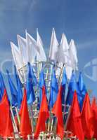 colored flags on a blue sky background