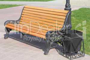 wooden bench with an urn