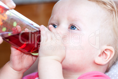 Baby drinking from the bottle