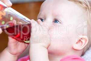 Baby drinking from the bottle