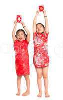 Happy Asian children holding red packet
