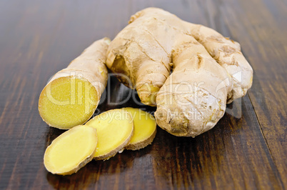 ginger root cut into the dark board