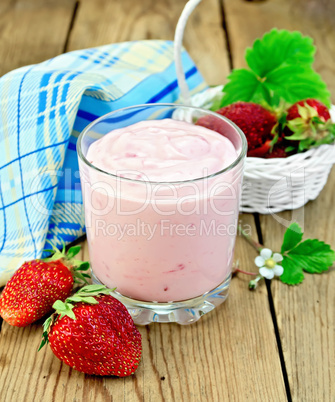 milkshake with strawberries in a white basket