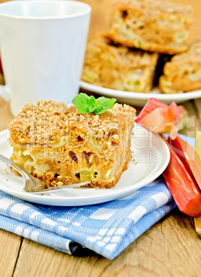 pie with rhubarb and mint on the board