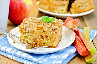 pie with rhubarb and apples on the board