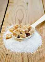 sugar brown and granulated sugar in a spoon on the board